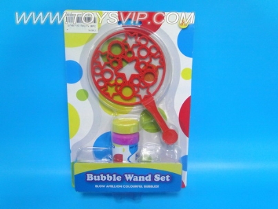Hand blowing bubbles
